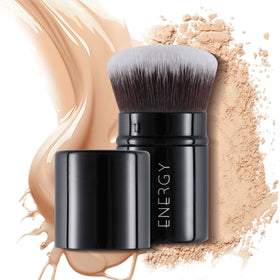 ENERGY kabuki brush front view showing compact travel-ready design and protective cap