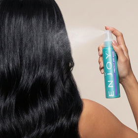 Enjoy in styling scene on vanity illustrating soft, shiny finished hair