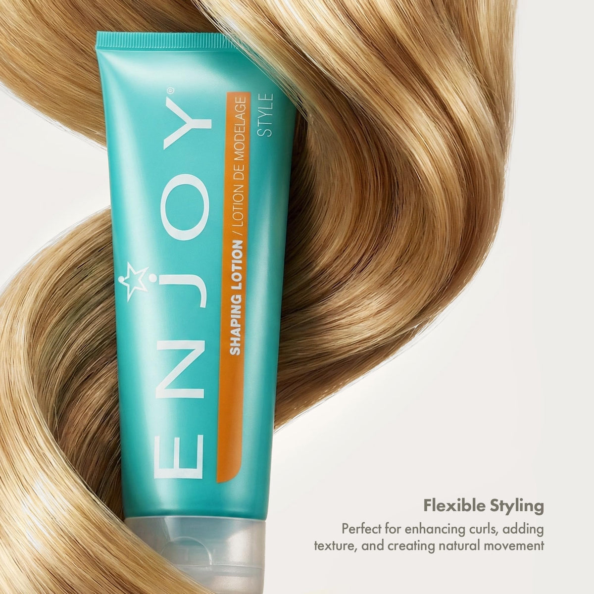 Enjoy shaping lotion applied to curly hair showing enhanced curl definition and soft movement