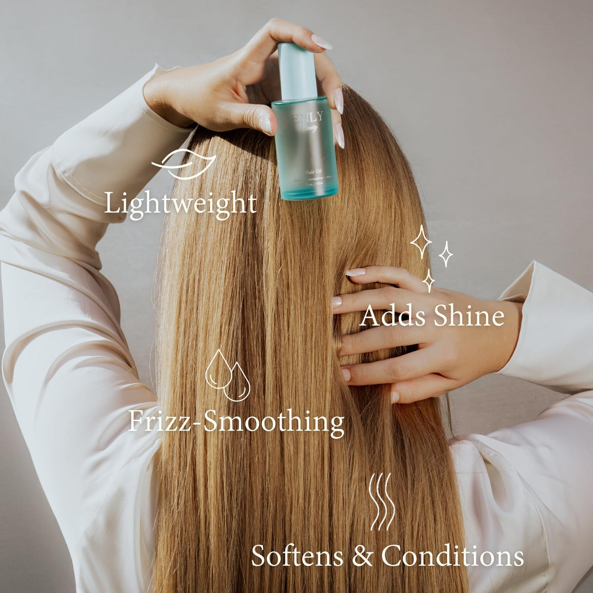 enly beauty application on straight hair showing smooth, glossy lengths