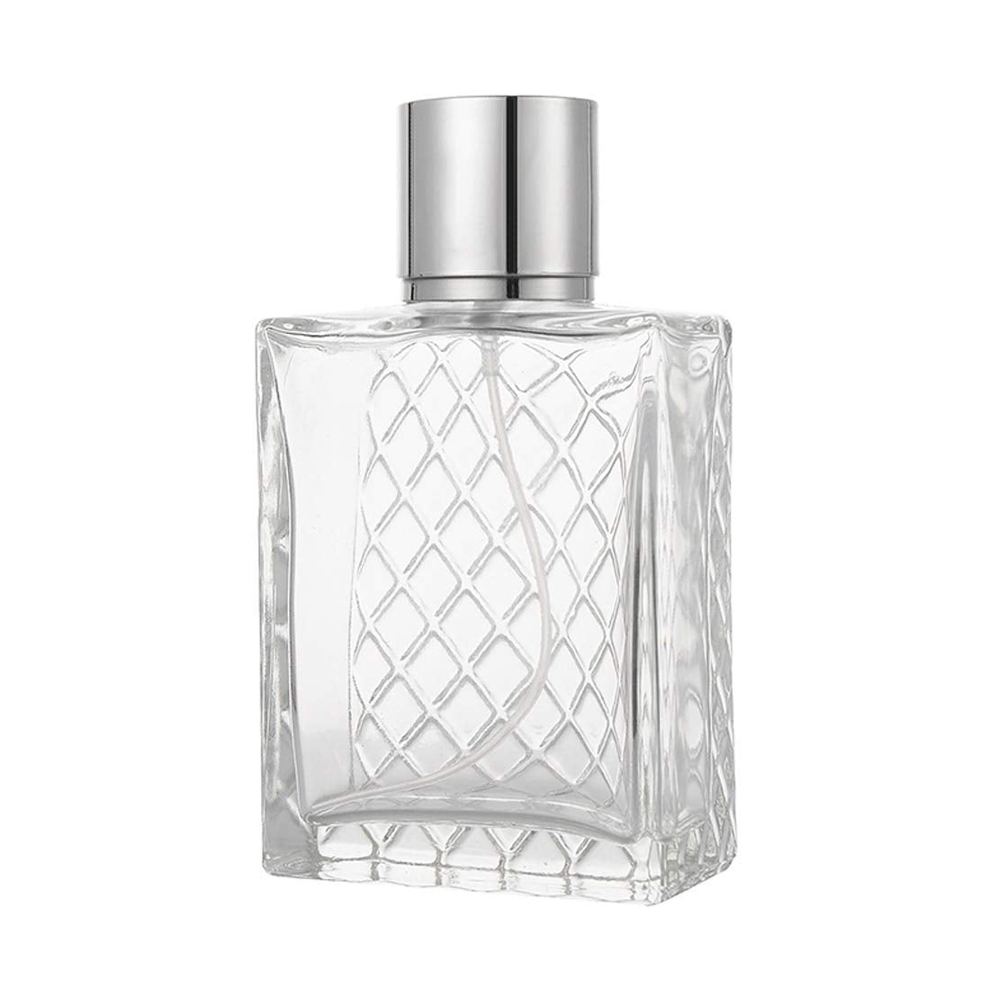 Enslz 100ml bottle next to coin to show accurate size and portability