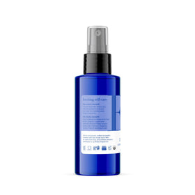 EO bottle size comparison with hand showing compact 4 oz scale benefit