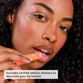 eos balm being applied to lips demonstrating smooth hydration and flavor layering