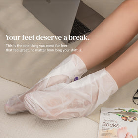 Epielle socks beside a hand for size and scale clarity