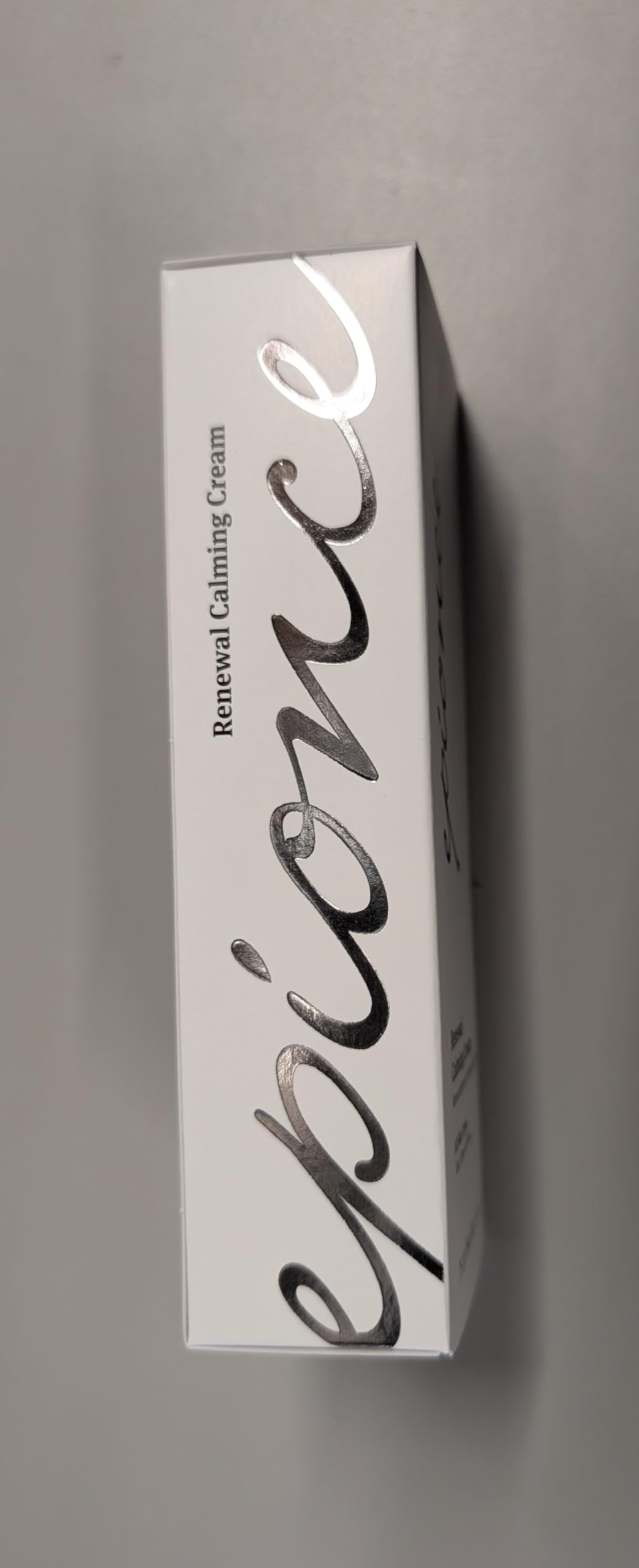 Epionce jar on bathroom shelf illustrating integration into skincare routine