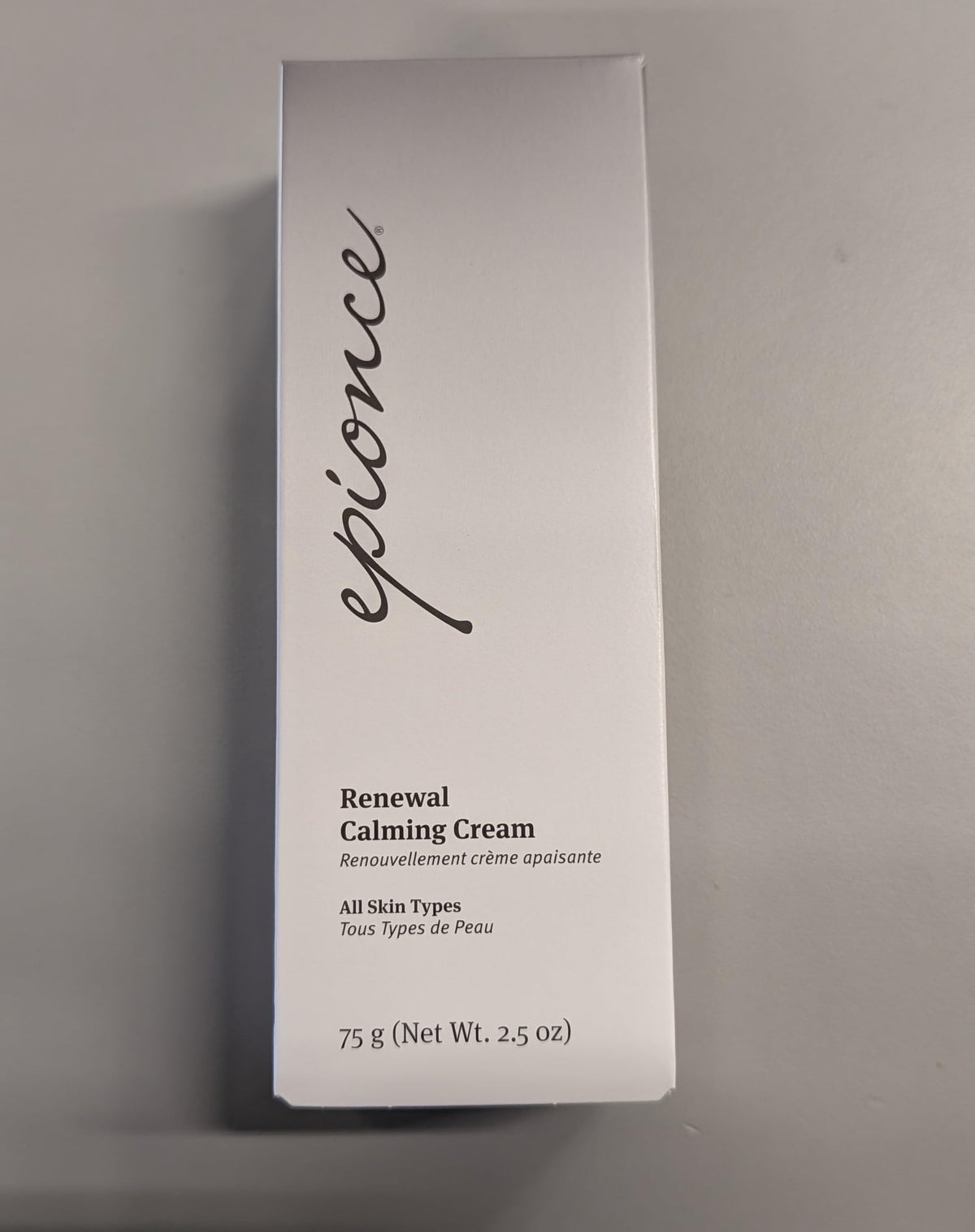 Epionce smoothing cream on elbow showing hydration for rough patches