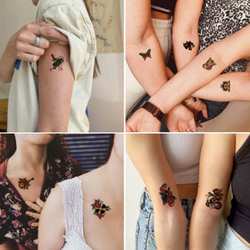 Epuxiael applying tattoo to forearm demonstrating simple water transfer application