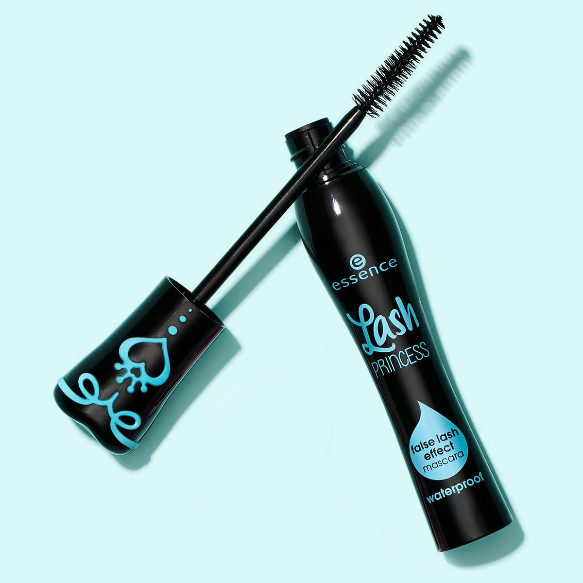 essence ingredients and label close-up showing vegan, paraben-free formulation benefits
