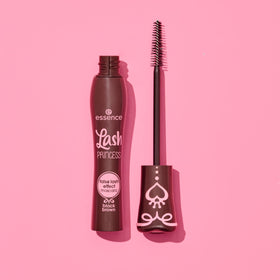 essence Lash Princess model applying mascara in a natural makeup setting