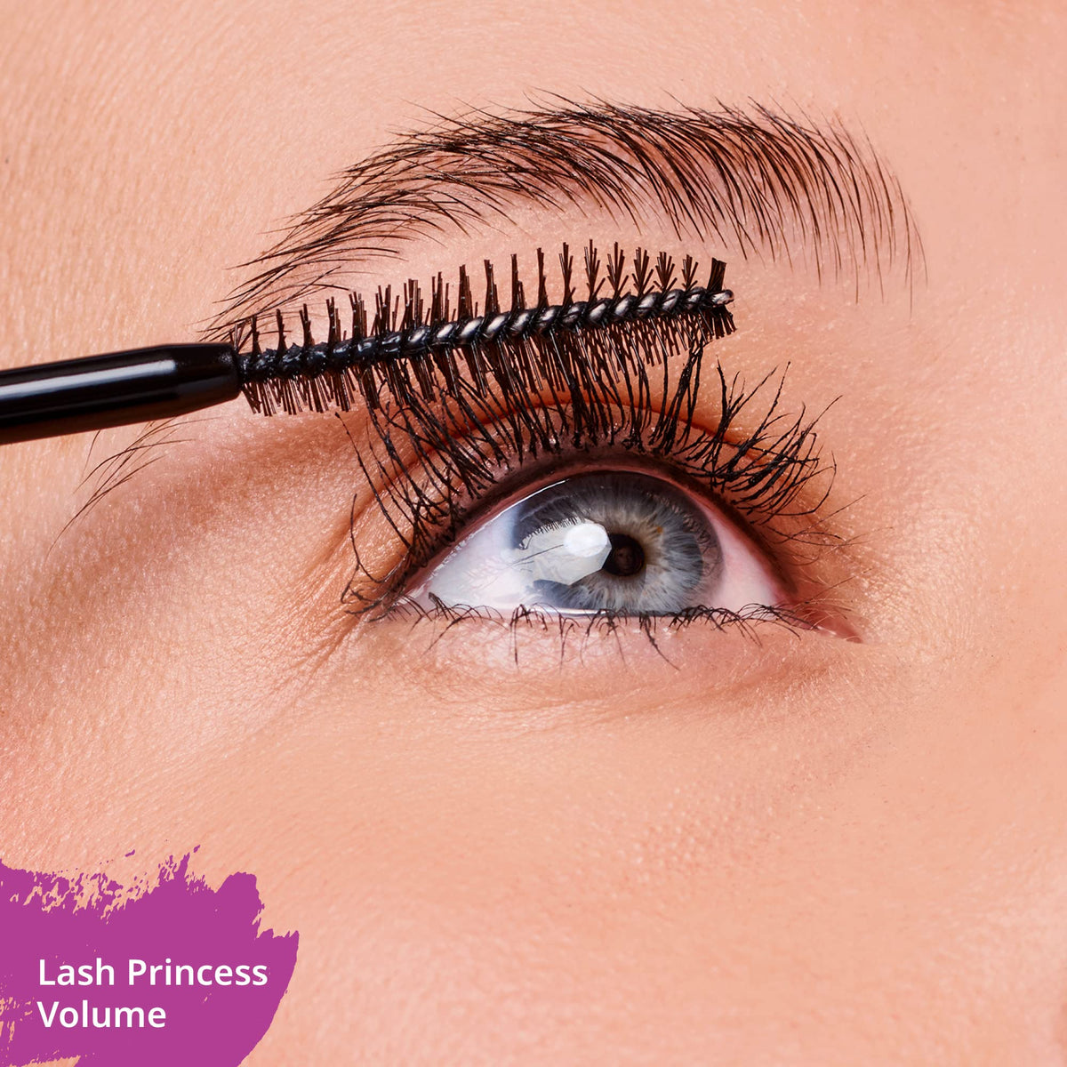 essence model wearing mascara for daytime look demonstrating natural volume benefit
