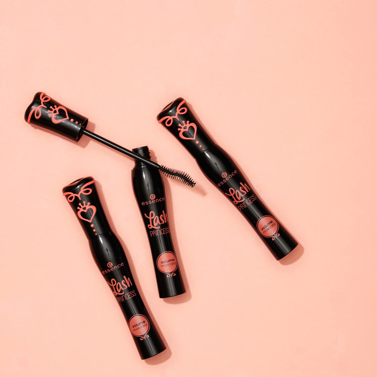 essence mascara held in hand to show scale and ease-of-use benefit