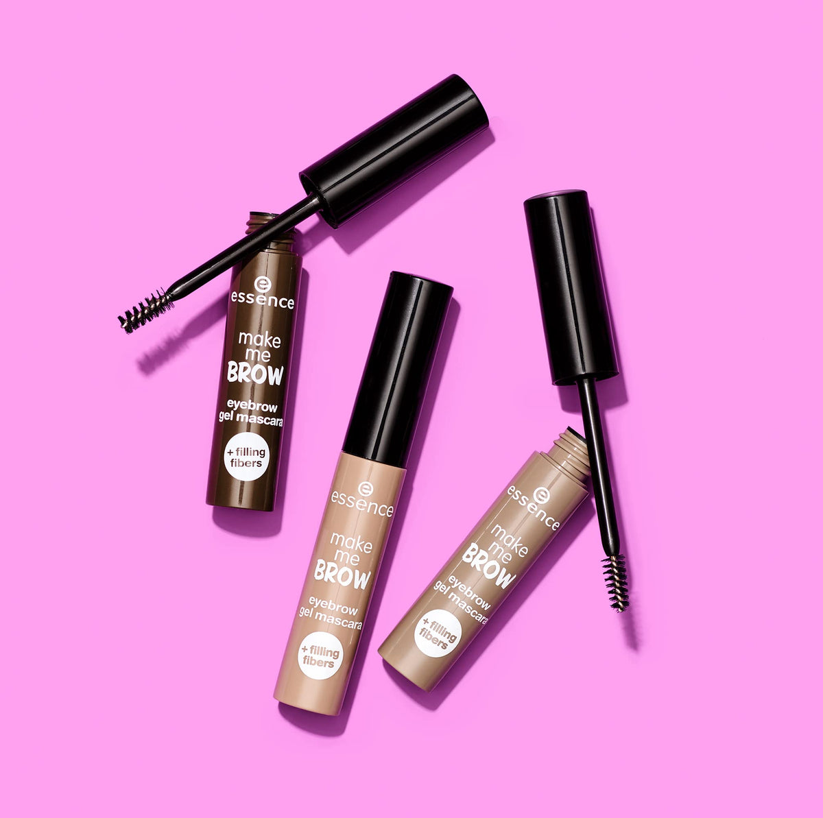 essence tube held in hand to show size and travel-friendly convenience