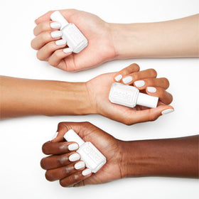 essie Blanc swatch on nail wheel displaying opaque color payoff and coverage