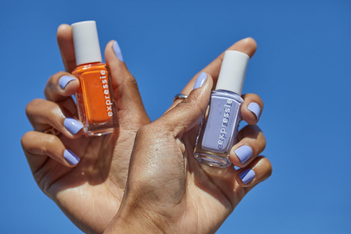 essie lifestyle flatlay with manicure tools showing ready-to-go polish