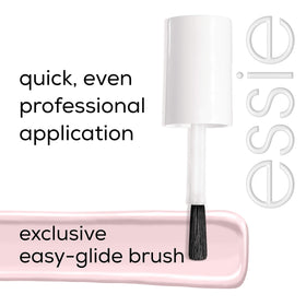 essie bottle in a lifestyle setting with manicure tools showing professional look benefit