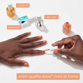 essie bottle next to a ruler illustrating 0.46 oz size and scale