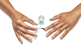 essie bottle label close-up highlighting product name and vegan benefit