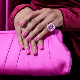 essie swatch on a wrist showing true Pinky Ring color payoff benefit