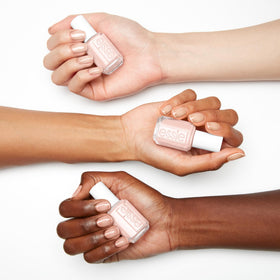 essie swatch on nails demonstrating peach shade and even coverage
