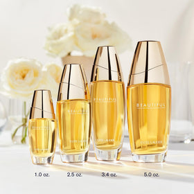 Estée Lauder atomizer close-up spray head demonstrating precise application and control