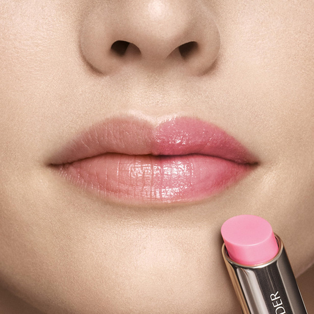 Estée Lauder balm twist closed showing portable tube and secure closure benefit