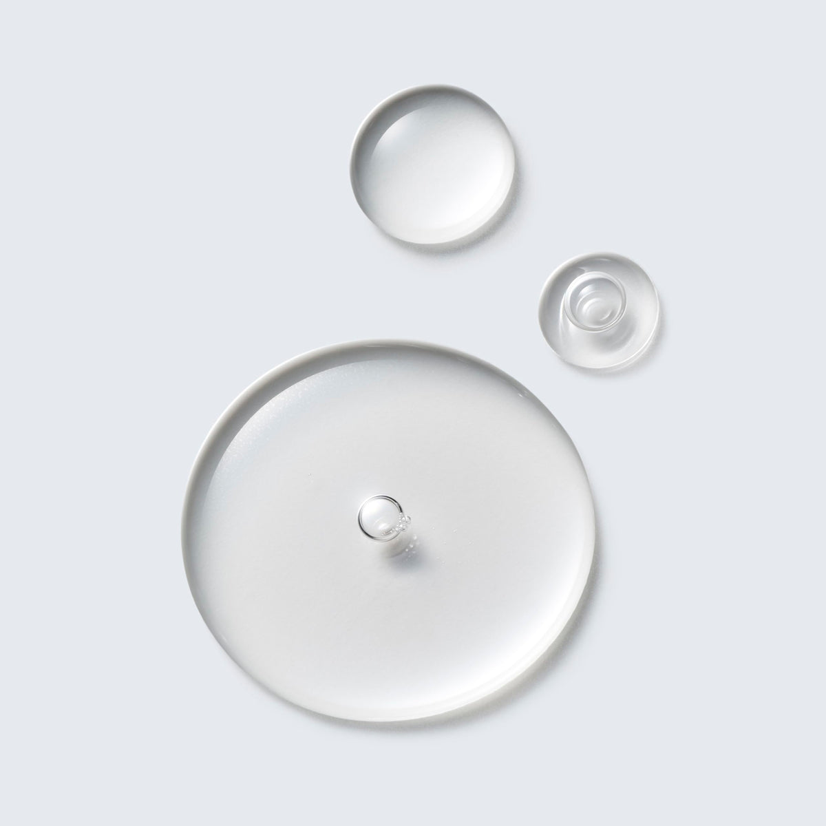 Estée Lauder close-up of liquid pouring to show lightweight texture benefit