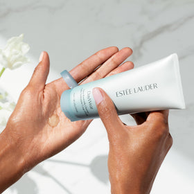 Estée Lauder product in bathroom lifestyle shot suggesting energizing morning ritual