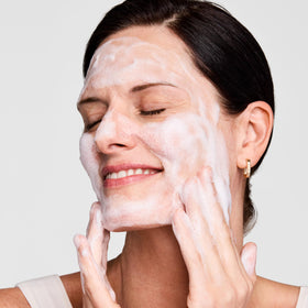 Estée Lauder applied as a 3-minute mask on cheek showing deep-clean treatment benefit