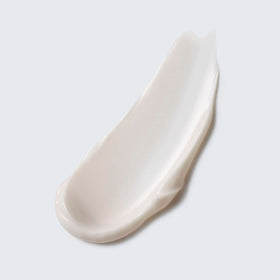 Estée Lauder eye cream on vanity with skincare items illustrating daily routine benefit youthful appearance