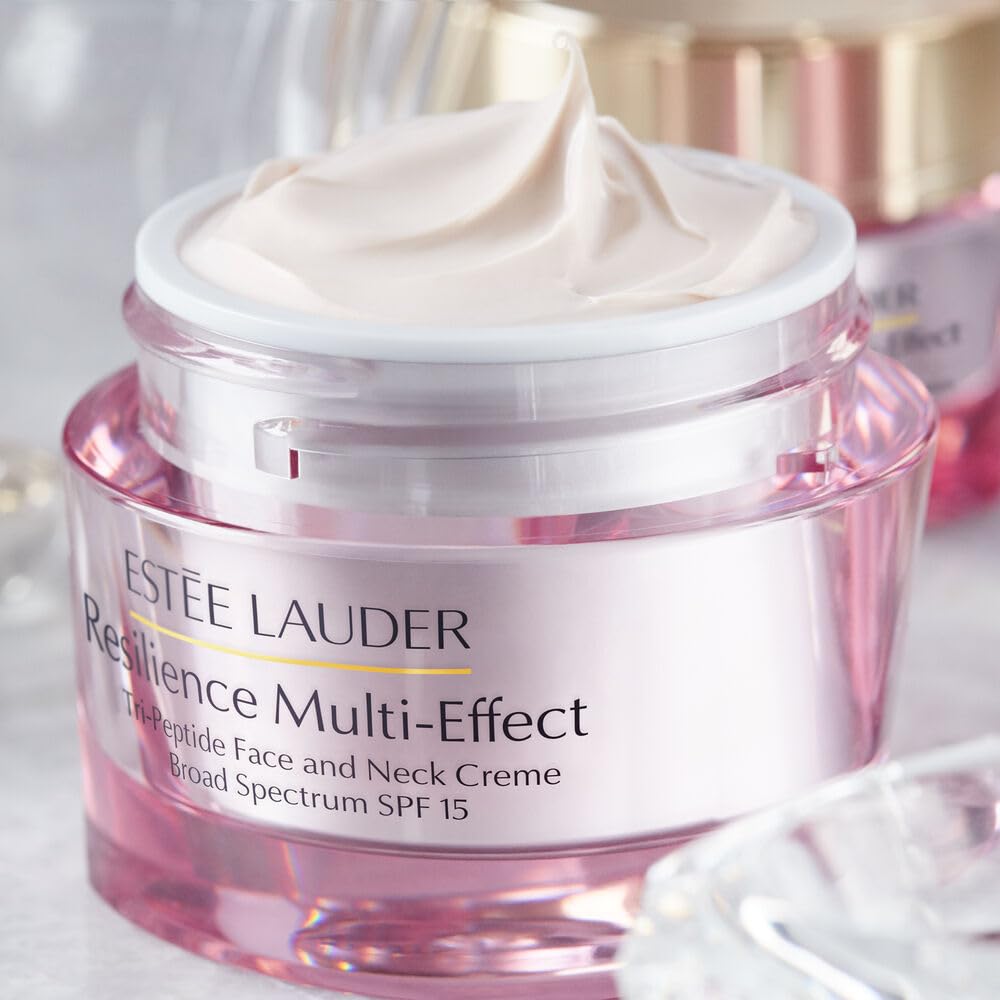 Estée Lauder model applying moisturizer to neck for firmer look