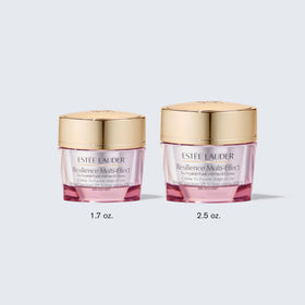 Estée Lauder 2.5 oz jar beside coin for size reference and scale