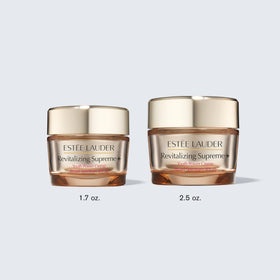 Estée Lauder 2.5 oz jar next to everyday items showing compact travel-friendly size