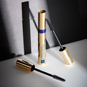 Estée Lauder texture swatch on skin showing mousse-light formula and fiber blend benefit