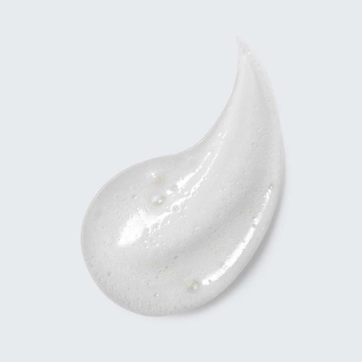 Estée Lauder foamy texture close-up illustrating rich lather and gentle cleansing benefit
