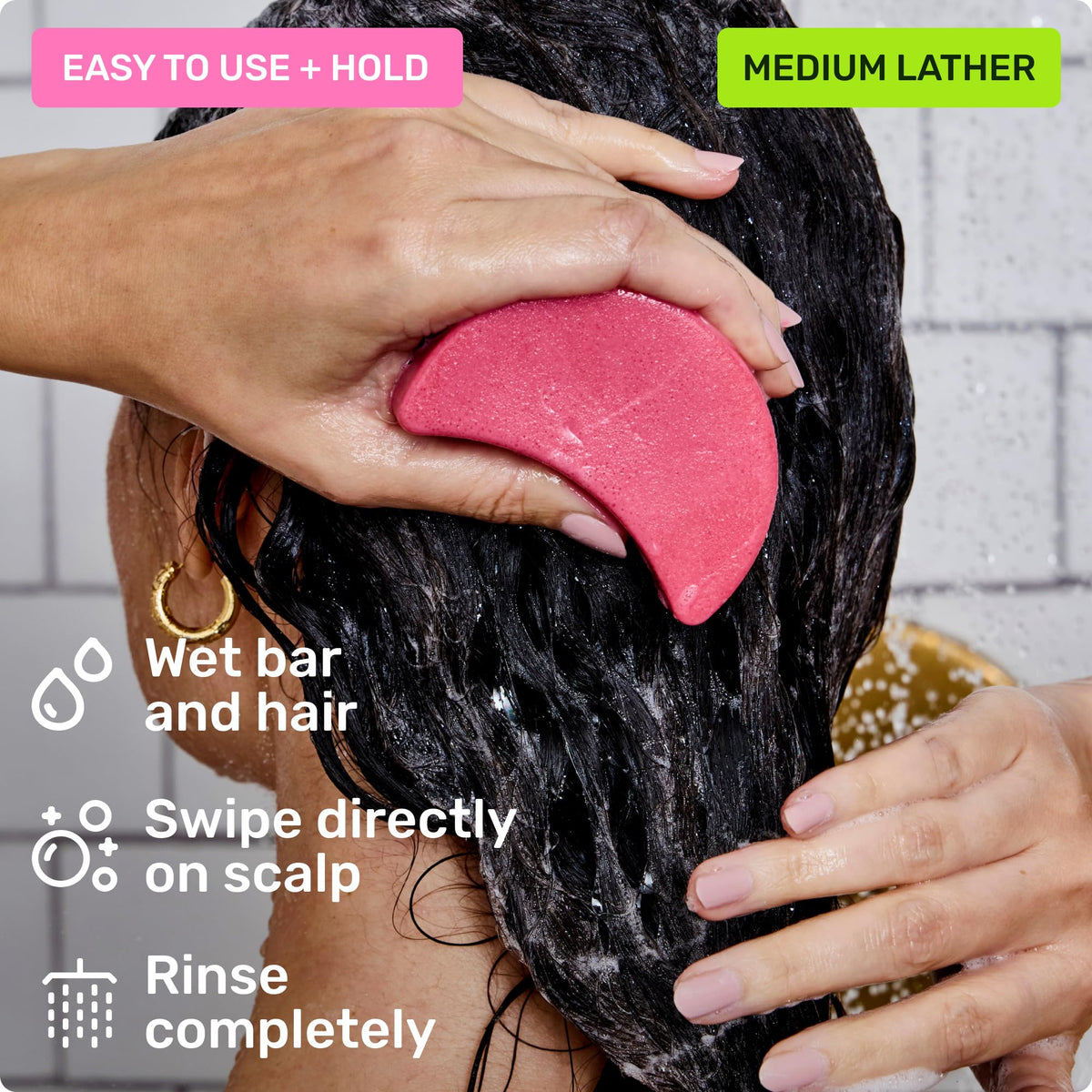 Ethique Everyday Shampoo Bar next to coconut to highlight nourishing ingredient