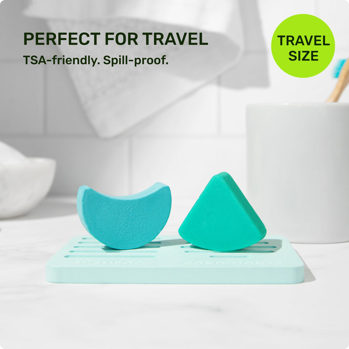 Ethique bars beside passport and toothbrush showing compact travel-friendly size