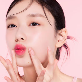ETUDE lifestyle shot holding tint showing effortless beauty touch-up