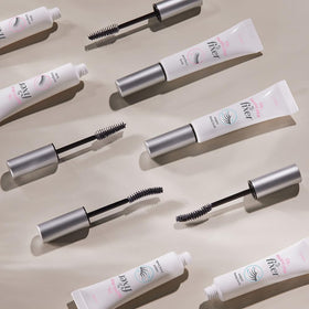 ETUDE lifestyle vanity scene with primer next to mascara to show routine use