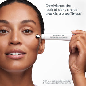 Eucerin 0.5 oz tube next to a coin showing compact travel-friendly size