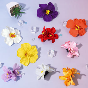 Eunhdet assorted flower clips laid out showing color options for outfits