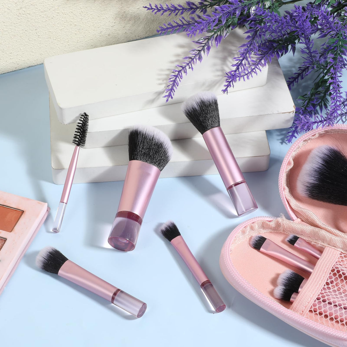 EupHHonycs applying eyeshadow with a mini brush for precise blending benefit