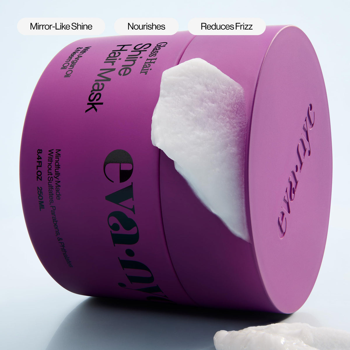 EVA·NYC treated hair showing glassy mirror-like shine and smoothness