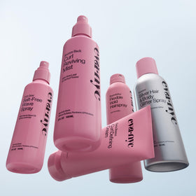 EVA·NYC hand holding 5 fl oz bottle to show travel-friendly size