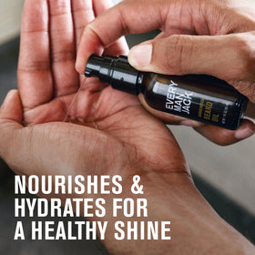 Every Man Jack beard oil being applied under beard to hydrate skin and soften hair