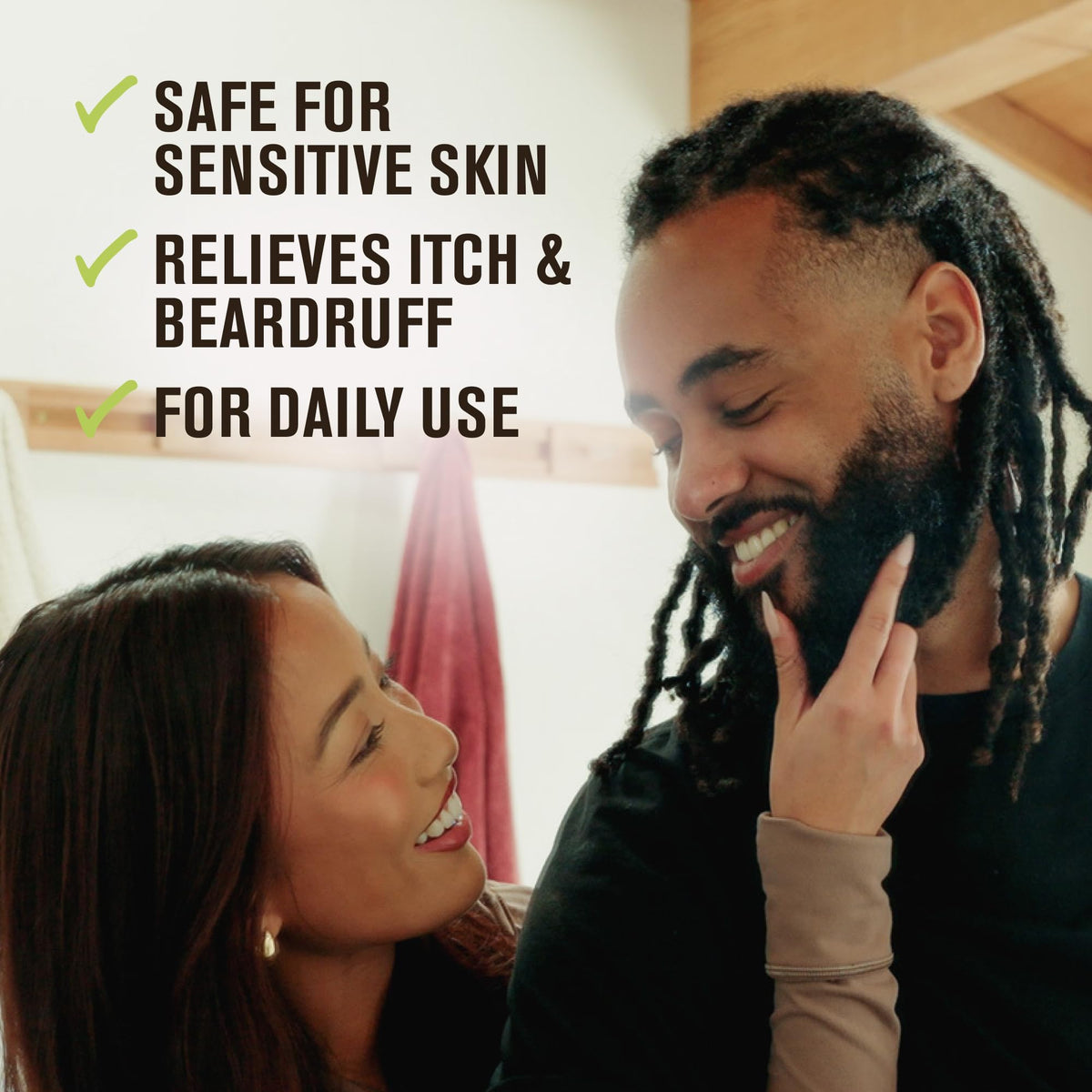 Every Man Jack beard oil dropper applying nourishing oil to beard