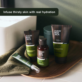 Every Man Jack duo held in a hand showing travel-friendly size benefit: easy to use