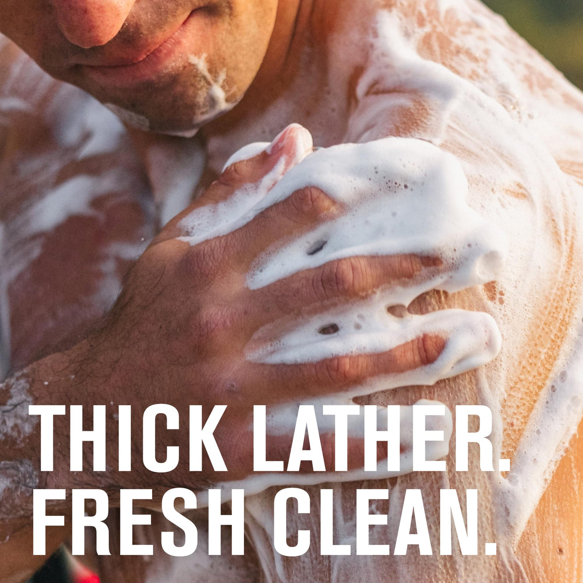 Every Man Jack bottle positioned in a shower showing refreshing daily-use benefit