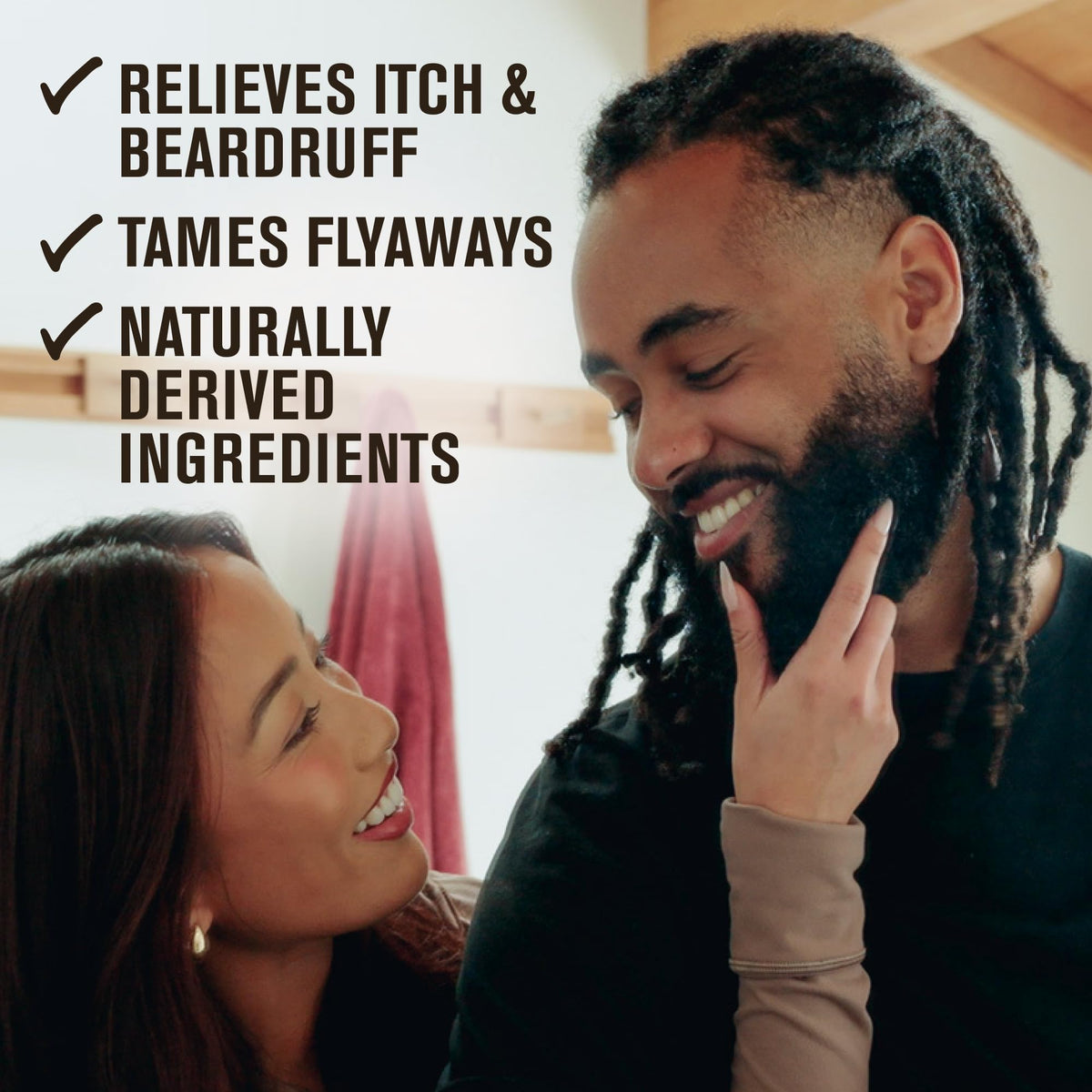 Applying Every Man Jack oil into palms ready to hydrate beard and nourish skin