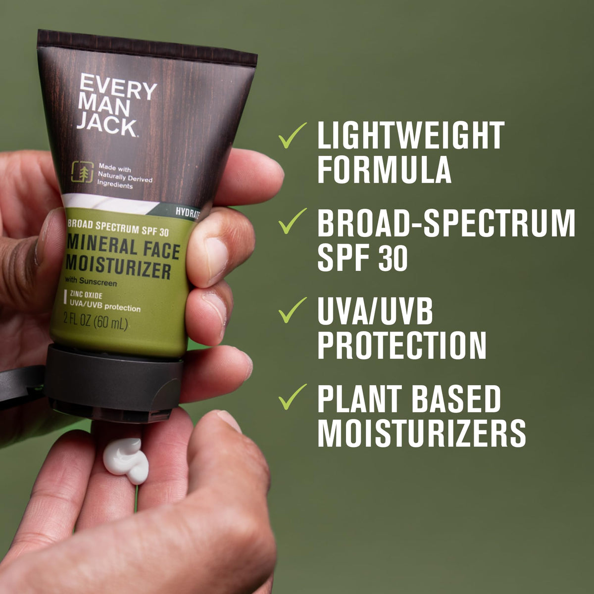 Every Man Jack cream on fingers demonstrating lightweight spreadability benefit