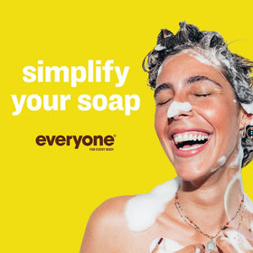 everyone brand essential oil drops and coconut halves illustrating natural scent